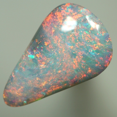 SOLID SEMI BLACK OPAL Sparkling bright reds over blue